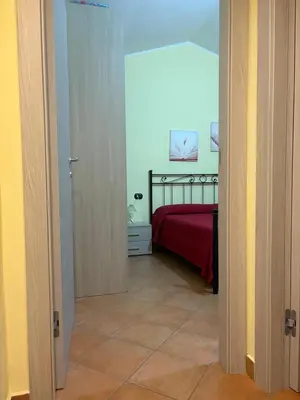 Letto o letti in una camera di Villa Sara