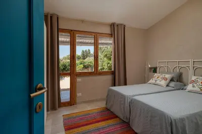 Letto o letti in una camera di Villa Angelica with private access to beach