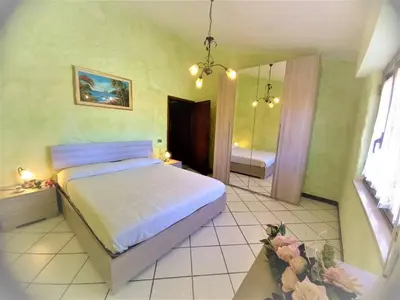 Letto o letti in una camera di Il Ginepro