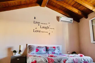 Letto o letti in una camera di Casa vacanze 