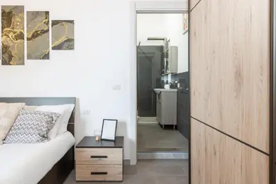 Letto o letti in una camera di Costa Ovest Apartment Waves