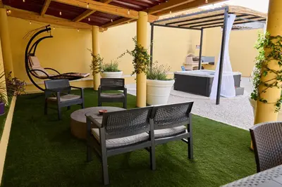 Area soggiorno di Costa Ovest Apartment Waves