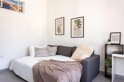 Letto o letti in una camera di Costa Ovest Apartment Waves