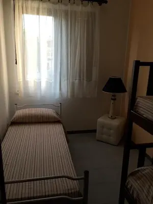 Letto o letti in una camera di Casa Simona