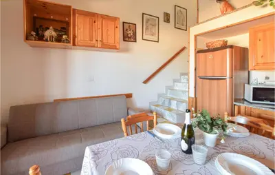 Cucina o angolo cottura di Lovely Apartment In Torre Dei Corsari