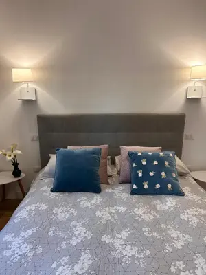 Letto o letti in una camera di B&B SU SICCU