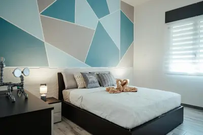 Letto o letti in una camera di La Pavoncella