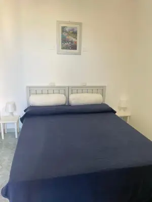 Letto o letti in una camera di -Torre dei Corsari- TERRAZZA SUL MARE