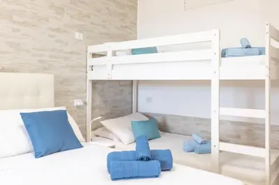 Letto o letti in una camera di Free Beach 1240 - 50 mt from the beach