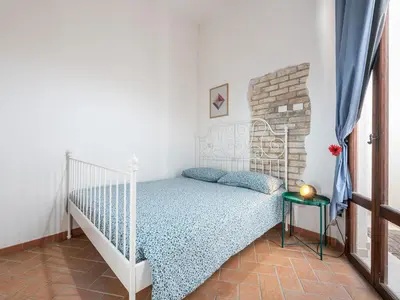 Letto o letti in una camera di Vico 9 - Cagliari Central House