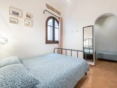 Letto o letti in una camera di Vico 9 - Cagliari Central House