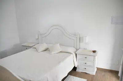 Letto o letti in una camera di B&B Villa Luisella
