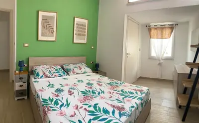 Letto o letti in una camera di La casa sotto il Fortino