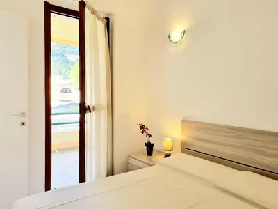 Letto o letti in una camera di Villa Smeralda 2