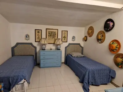 Letto o letti in una camera di Domus Maura