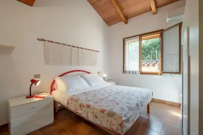 Letto o letti in una camera di [Sea view- 5 minutes from the beach] Garden, Wi-Fi, bbq