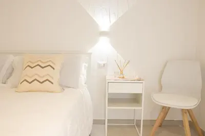 Letto o letti in una camera di Guest House Sciola - TS ROOMS B&B