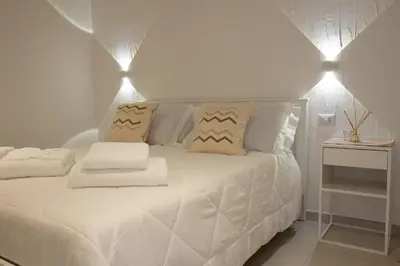 Letto o letti in una camera di Guest House Sciola - TS ROOMS B&B