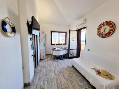 Letto o letti in una camera di Amazing view apartment close to the beach Costa Rei