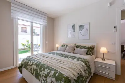 Letto o letti in una camera di Colombo Palace - viale colombo 358