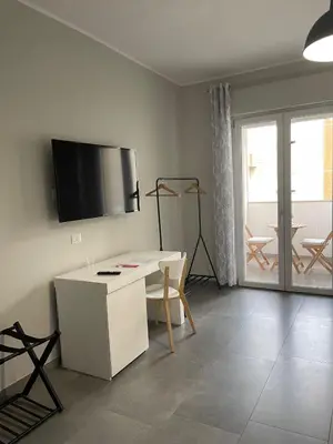 TV o dispositivi per l'intrattenimento presso ViaRiva Rooms