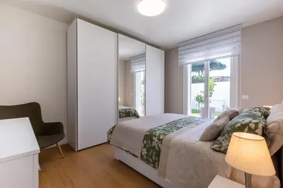Letto o letti in una camera di Colombo palace - suite eden via perda bona 35a