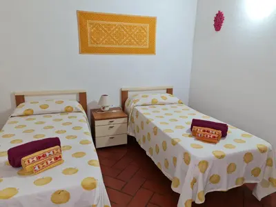 Letto o letti in una camera di La Casa di Tella - Portopaglia free wifi - free parking