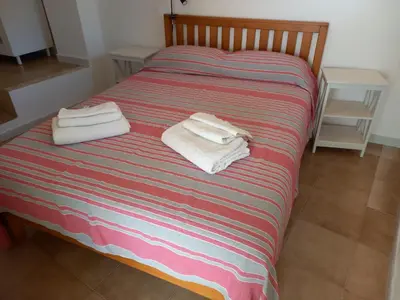 Letto o letti in una camera di Casa Buenavista Villasimius