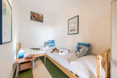 Letto o letti in una camera di Casa Buenavista Villasimius