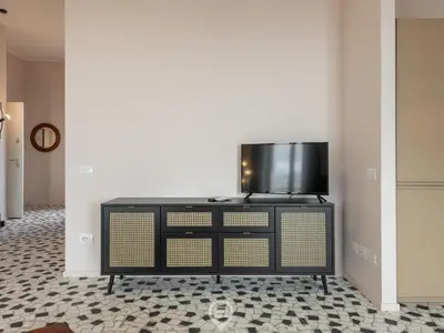 TV o dispositivi per l'intrattenimento presso Harbor View Apartment