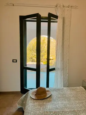 Letto o letti in una camera di SOFI HOUSE