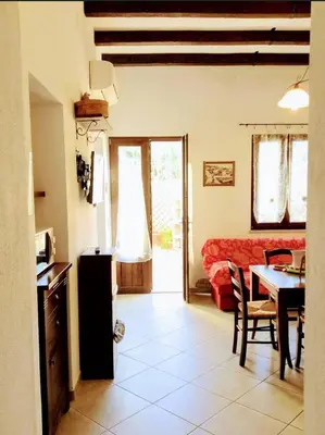 Area soggiorno di B&B Su Frori Arrubiu