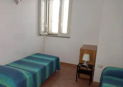Letto o letti in una camera di VILLALoddo2 sud Tertenia