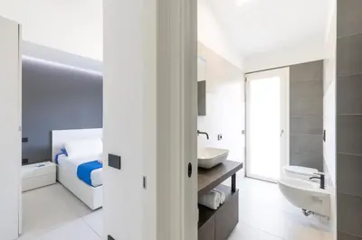 Letto o letti in una camera di Casabenessere