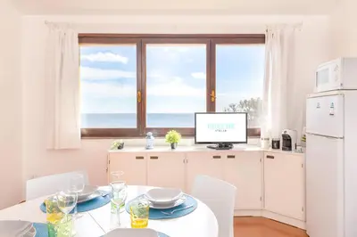 Cucina o angolo cottura di Fronte Mare Pinus Village 74
