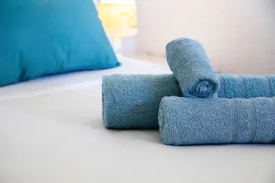 Letto o letti in una camera di Fronte Mare Pinus Village 74