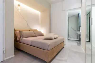 Letto o letti in una camera di Suite Cagliari