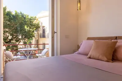 Letto o letti in una camera di Suite Cagliari
