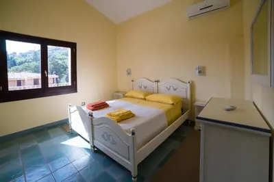 Letto o letti in una camera di Villa Ara