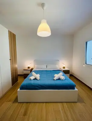 Letto o letti in una camera di Casa di Tinny