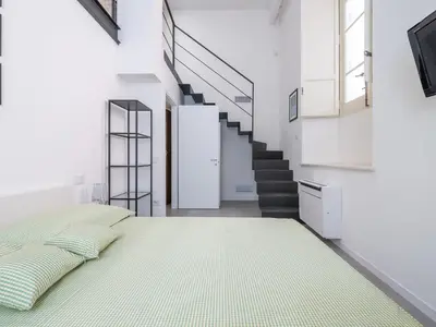 Letto o letti in una camera di Massimo Boutique Apartment