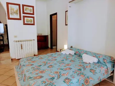 Letto o letti in una camera di casa panoramica