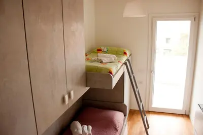 Letto o letti in una camera di Gioja suite