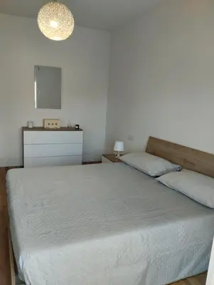 Letto o letti in una camera di Gioja suite