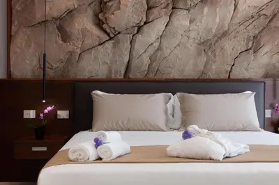 Letto o letti in una camera di Palazzo Ferrucci Luxury Suites