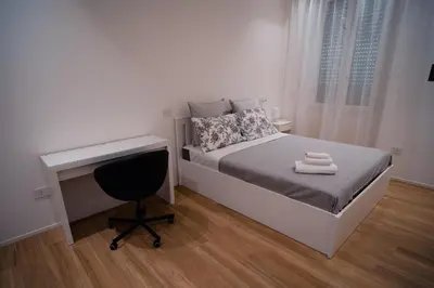 Letto o letti in una camera di Sunny city