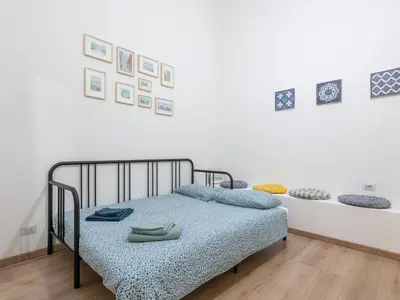 Letto o letti in una camera di San Lucifero - Cagliari Central House