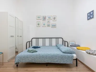 Letto o letti in una camera di San Lucifero - Cagliari Central House