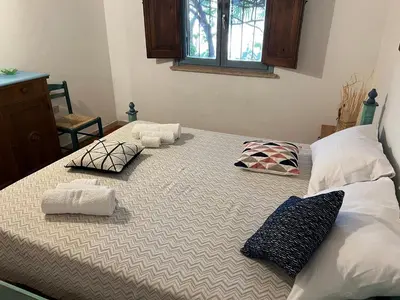 Letto o letti in una camera di Piccolo Borgo di Pescatori
