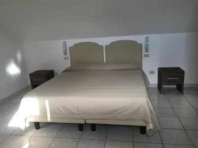 Letto o letti in una camera di Appartamento Villanova